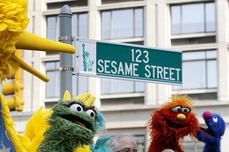 Sesame Street characters are seen during the 40th anniversary street naming celebration in New York, November 9, 2009. REUTERS/Shannon Stapl Sesame Street characters are seen during the 40th anniversary street naming celebration in New York, November 9, 2009. REUTERS/Shannon Stapl