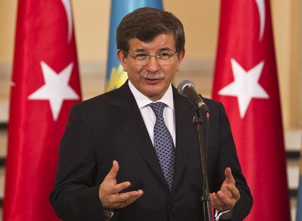 Turkey's Foreign Minister Ahmet Davutoglu speaks during a news briefing with Kazakhstan's Foreign Minister Yerlan Idrisov in Almaty April 26 Turkey's Foreign Minister Ahmet Davutoglu speaks during a news briefing with Kazakhstan's Foreign Minister Yerlan Idrisov in Almaty April 26
