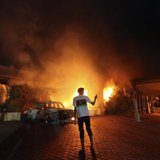 The U.S. Consulate in Benghazi is seen in flames during a protest by an armed group said to have been protesting a film being produced in th
