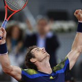Andy Murray of Britain celebrates his victory over Gilles Simon of France in their men's singles match at the Madrid Open tennis tournament,