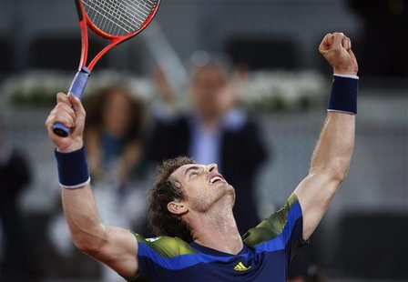 Andy Murray of Britain celebrates his victory over Gilles Simon of France in their men's singles match at the Madrid Open tennis tournament, Andy Murray of Britain celebrates his victory over Gilles Simon of France in their men's singles match at the Madrid Open tennis tournament,
