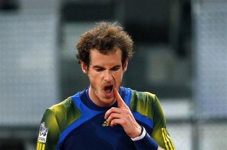 Andy Murray of Britain reacts during his men's singles quarterfinal match against Tomas Berdych of the Czech Republic at the Madrid Open ten Andy Murray of Britain reacts during his men's singles quarterfinal match against Tomas Berdych of the Czech Republic at the Madrid Open ten