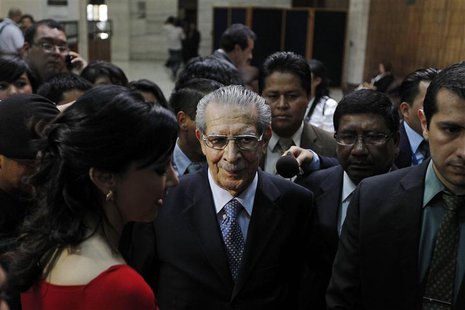 Former Guatemalan dictator Efrain Rios Montt (C) leaves the last session of his genocide trial at the Supreme Court of Justice in Guatemala Former Guatemalan dictator Efrain Rios Montt (C) leaves the last session of his genocide trial at the Supreme Court of Justice in Guatemala