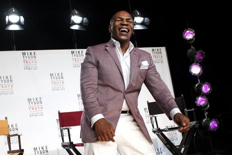 Former heavyweight champion Mike Tyson laughs as he talks about the Broadway debut of his one-man show "Mike Tyson: Undisputed Truth" during Former heavyweight champion Mike Tyson laughs as he talks about the Broadway debut of his one-man show "Mike Tyson: Undisputed Truth" during
