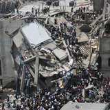  People rescue garment workers trapped under rubble at the Rana Plaza building after it collapsed, in Savar, 30 km (19 miles) outside Dhaka in this April 24, 2013 file photo. 
Credit: REUTERS/Andrew Biraj