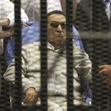 Egypt's ousted President Hosni Mubarak sits inside a dock at the police academy on the outskirts of Cairo April 15, 2013. REUTERS/Stringer
