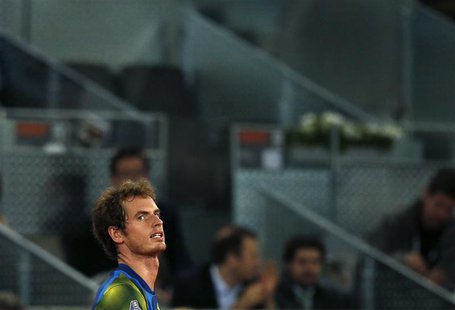 Andy Murray of Britain reacts during his men's singles quarterfinal match against Tomas Berdych of the Czech Republic at the Madrid Open ten Andy Murray of Britain reacts during his men's singles quarterfinal match against Tomas Berdych of the Czech Republic at the Madrid Open ten