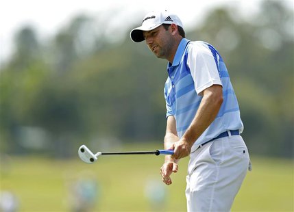 Spain's Sergio Garcia watches his putt on the sixth green during the third round of The Players Championship PGA golf tournament at TPC Sawg Spain's Sergio Garcia watches his putt on the sixth green during the third round of The Players Championship PGA golf tournament at TPC Sawg