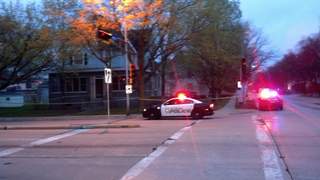 Green Bay Police squad cars seen near the scene of a suspicious death on May 11, 2013. (courtesy of FOX 11). Green Bay Police squad cars seen near the scene of a suspicious death on May 11, 2013. (courtesy of FOX 11).