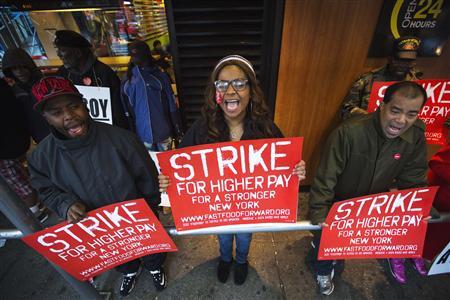 Demonstrators protesting low wages and the lack of union representation in the fast food industry chant and hold signs outside of a McDonald's restaurant near Times Square in New York, April 4, 2013.
REUTERS/Lucas Jackson Demonstrators protesting low wages and the lack of union representation in the fast food industry chant and hold signs outside of a McDonald's restaurant near Times Square in New York, April 4, 2013.
REUTERS/Lucas Jackson
