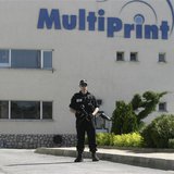 Bulgarian police stand guard outside a printing house in the town of Kostinbrod, near Sofia May 11, 2013. REUTERS/Lyubomir Spirov/BGNES Bulgarian police stand guard outside a printing house in the town of Kostinbrod, near Sofia May 11, 2013. REUTERS/Lyubomir Spirov/BGNES