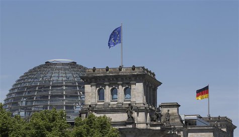 The EU and the German national flag are set up atop the Reichstag building, seat of the German lower house of parliament Bundestag in Berlin The EU and the German national flag are set up atop the Reichstag building, seat of the German lower house of parliament Bundestag in Berlin