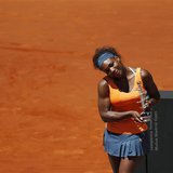 Serena Williams of the U.S. poses with the Ion Tiriac's trophy after winning the Madrid Open final tennis match against Maria Sharapova of R Serena Williams of the U.S. poses with the Ion Tiriac's trophy after winning the Madrid Open final tennis match against Maria Sharapova of R