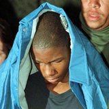 Malcolm Shabazz is led in handcuffs by police officers from Yonkers Family Court in Yonkers, New York, in a file photo after his second appe Malcolm Shabazz is led in handcuffs by police officers from Yonkers Family Court in Yonkers, New York, in a file photo after his second appe