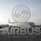 An A380 aircraft is seen through a window with an Airbus logo during the EADS / Airbus 'New Year Press Conference' in Hamburg January 17, 20 An A380 aircraft is seen through a window with an Airbus logo during the EADS / Airbus 'New Year Press Conference' in Hamburg January 17, 20