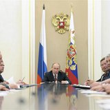 Russian President Vladimir Putin (C) attends a meeting of the Security Council in Moscow's Kremlin May 8, 2013. Picture taken May 8, 2013. R Russian President Vladimir Putin (C) attends a meeting of the Security Council in Moscow's Kremlin May 8, 2013. Picture taken May 8, 2013. R