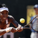 Venus Williams of the U.S. hits a return to Laura Robson of Britain during their women's singles match at the Rome Masters tennis tournament Venus Williams of the U.S. hits a return to Laura Robson of Britain during their women's singles match at the Rome Masters tennis tournament