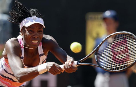 Venus Williams of the U.S. hits a return to Laura Robson of Britain during their women's singles match at the Rome Masters tennis tournament Venus Williams of the U.S. hits a return to Laura Robson of Britain during their women's singles match at the Rome Masters tennis tournament