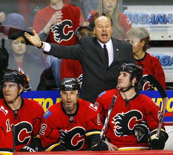 Calgary Flames coach Mike Keenan yells at the referee during the third period of Game 3 in their NHL Western Conference quarterfinal hockey Calgary Flames coach Mike Keenan yells at the referee during the third period of Game 3 in their NHL Western Conference quarterfinal hockey