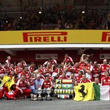 The Ferrari Formula One team pose for photographers with their trophies after drivers Fernando Alonso of Spain and Felipe Massa of Brazil wo The Ferrari Formula One team pose for photographers with their trophies after drivers Fernando Alonso of Spain and Felipe Massa of Brazil wo
