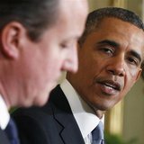 U.S. President Barack Obama (R) looks toward Britain's Prime Minister David Cameron (L) during a joint news conference in the East Room of t U.S. President Barack Obama (R) looks toward Britain's Prime Minister David Cameron (L) during a joint news conference in the East Room of t