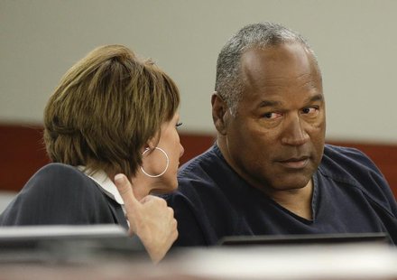 O.J. Simpson (R) sits with his attorney, Patricia Palm in Clark County District Court during his evidentiary hearing in Las Vegas, Nevada Ma O.J. Simpson (R) sits with his attorney, Patricia Palm in Clark County District Court during his evidentiary hearing in Las Vegas, Nevada Ma