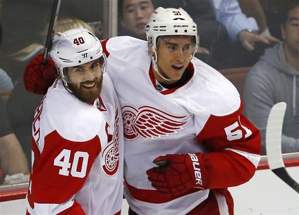 Detroit Red Wings center Henrik Zetterberg (40) celebrates his first period goal against the Anaheim Ducks with his teammate Valtteri Filppu Detroit Red Wings center Henrik Zetterberg (40) celebrates his first period goal against the Anaheim Ducks with his teammate Valtteri Filppu