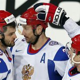 Russia's Ilya Kovalchuk (C) celebrates his goal against Austria with teammates Alexander Radulov (L) and Alexei Tereshenko during their 2013 Russia's Ilya Kovalchuk (C) celebrates his goal against Austria with teammates Alexander Radulov (L) and Alexei Tereshenko during their 2013