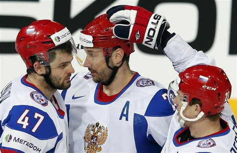 Russia's Ilya Kovalchuk (C) celebrates his goal against Austria with teammates Alexander Radulov (L) and Alexei Tereshenko during their 2013 Russia's Ilya Kovalchuk (C) celebrates his goal against Austria with teammates Alexander Radulov (L) and Alexei Tereshenko during their 2013