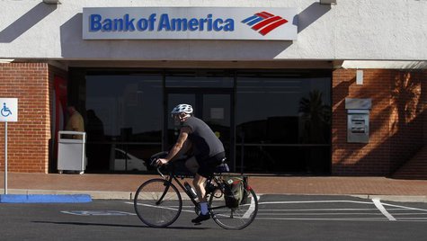 A bicyclist rides past a Bank of America in Tucson, Arizona January 21, 2011. REUTERS/Joshua Lott A bicyclist rides past a Bank of America in Tucson, Arizona January 21, 2011. REUTERS/Joshua Lott