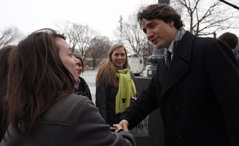 Canadian Liberal leader Justin Trudeau shakes the hand of a pedestrian after a news conference outside of the National Assembly in Quebec Ci Canadian Liberal leader Justin Trudeau shakes the hand of a pedestrian after a news conference outside of the National Assembly in Quebec Ci