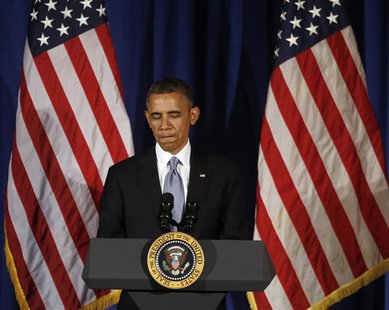 U.S. President Barack Obama reacts as he speaks at a Democratic Party fundraiser at the Waldorf Astoria hotel in New York, May 13, 2013. REU U.S. President Barack Obama reacts as he speaks at a Democratic Party fundraiser at the Waldorf Astoria hotel in New York, May 13, 2013. REU