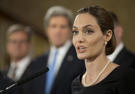 Actress and humanitarian campaigner Angelina Jolie speaks at a news conference on sexual violence against women during the G8 Foreign Minist Actress and humanitarian campaigner Angelina Jolie speaks at a news conference on sexual violence against women during the G8 Foreign Minist