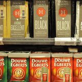 Packets of Douwe Egberts coffee are seen at a supermarket in Amsterdam April 12, 2013. REUTERS/Toussaint Kluiters/United Photos