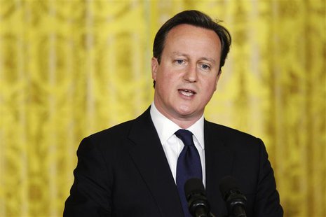 Britain's Prime Minister David Cameron responds to a question during a joint news conference with U.S. President Barack Obama in the East Ro Britain's Prime Minister David Cameron responds to a question during a joint news conference with U.S. President Barack Obama in the East Ro