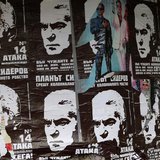 A woman walks past election posters of Volen Siderov, leader of the Attack party, in Sofia May 13, 2013. REUTERS/Stoyan Nenov