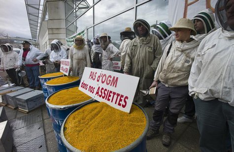 French beekeepers demonstrate to protest the use of genetically-modified organisms in front of French Monsanto headquarters in Bron, near Ly French beekeepers demonstrate to protest the use of genetically-modified organisms in front of French Monsanto headquarters in Bron, near Ly