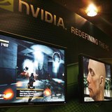 A sales man demonstrates a computer game in a display area of Nvidia Corp. during the second day of the annual 2007 Computex Taipei June 6, 