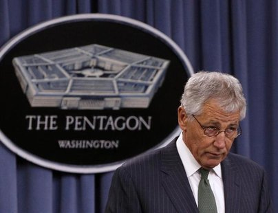 U.S. Defense Secretary Chuck Hagel and British Defense Secretary Philip Hammond (not pictured) hold a joint news conference at the Pentagon U.S. Defense Secretary Chuck Hagel and British Defense Secretary Philip Hammond (not pictured) hold a joint news conference at the Pentagon