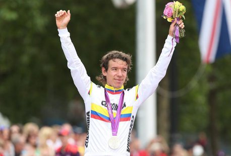 Silver medalist Rigoberto Uran of Colombia celebrates during the victory ceremony after the men's cycling road race at the London 2012 Olymp Silver medalist Rigoberto Uran of Colombia celebrates during the victory ceremony after the men's cycling road race at the London 2012 Olymp