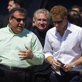 Britain's Prince Harry (R) walks with New Jersey Governor Chris Christie as they view areas of the boardwalk that have been repaired in Seas