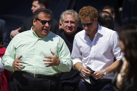 Britain's Prince Harry (R) walks with New Jersey Governor Chris Christie as they view areas of the boardwalk that have been repaired in Seas Britain's Prince Harry (R) walks with New Jersey Governor Chris Christie as they view areas of the boardwalk that have been repaired in Seas