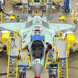 Workers can be seen on the moving line and forward fuselage assembly areas for the F-35 Joint Strike Fighter at Lockheed Martin Corp's facto