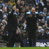 Manchester City's manager Roberto Mancini (L) and his assistant David Platt instruct their team during their FA Cup soccer match against Man Manchester City's manager Roberto Mancini (L) and his assistant David Platt instruct their team during their FA Cup soccer match against Man