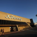 A couple walks by a J.C. Penney store in Arcadia, California March 1, 2013. REUTERS/Mario Anzuoni A couple walks by a J.C. Penney store in Arcadia, California March 1, 2013. REUTERS/Mario Anzuoni