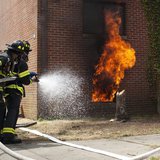 Firefighters put out a live fire during an experiment on Governors Island, in New York, July 3, 2012. REUTERS/Andrew Burton Firefighters put out a live fire during an experiment on Governors Island, in New York, July 3, 2012. REUTERS/Andrew Burton