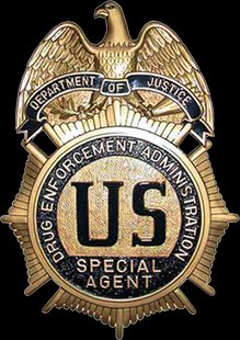 DEA Badge (courtesy of Wikimedia Commons). DEA Badge (courtesy of Wikimedia Commons).