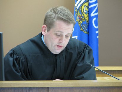 Judge John M. Yackel Judge John M. Yackel
