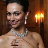 A model wears a diamond necklace/bracelet by Bulgari (1954) a natural pearl and diamond pendant earrings(1962) and a diamond ring (1962) dur A model wears a diamond necklace/bracelet by Bulgari (1954) a natural pearl and diamond pendant earrings(1962) and a diamond ring (1962) dur