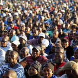 The mining community looks on as they are addressed by their leaders during a strike at Lonmin's Marikana platinum mine in Rustenburg, 100 k The mining community looks on as they are addressed by their leaders during a strike at Lonmin's Marikana platinum mine in Rustenburg, 100 k